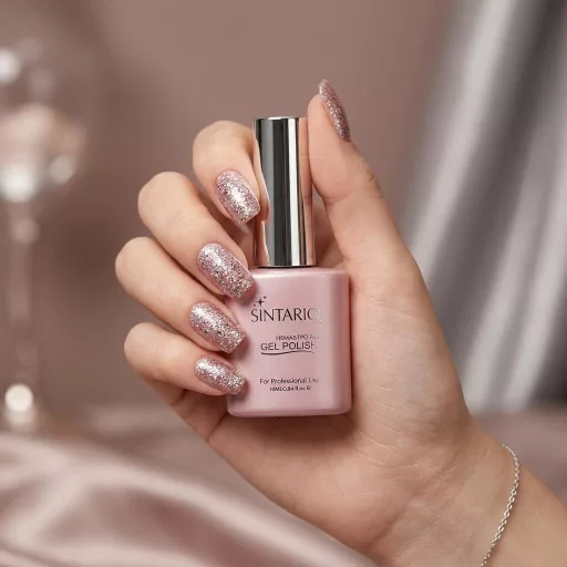 Sintario Géllakk 128 – lilás-rózsaszín alap rosé-arany csillámmal, HEMA mentes, 10ml